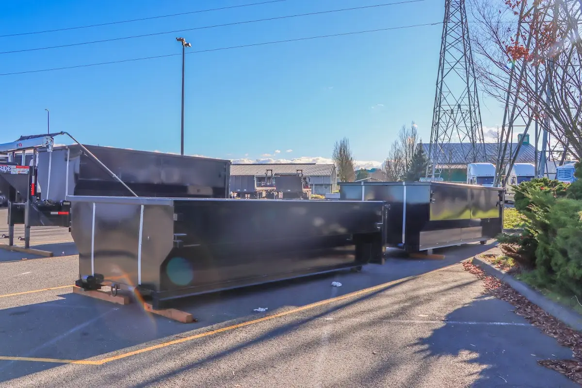 Roll-off dumpster ready for waste disposal at job site for Yard Waste Dumpster Rental in Jefferson
